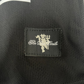 KIT INFANTIL RETRÔ MANCHESTER UNITED BLACK 08/09